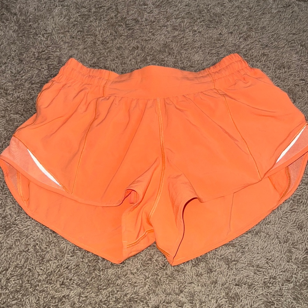 lululemon 2.5 hotty hot bright orange shorts
